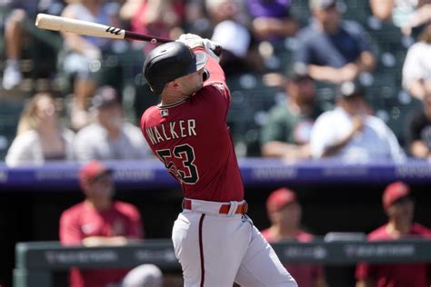 Walker homers twice, hitting 2-run shot in 8th in Diamondbacks’ 9-7 victory over Rockies